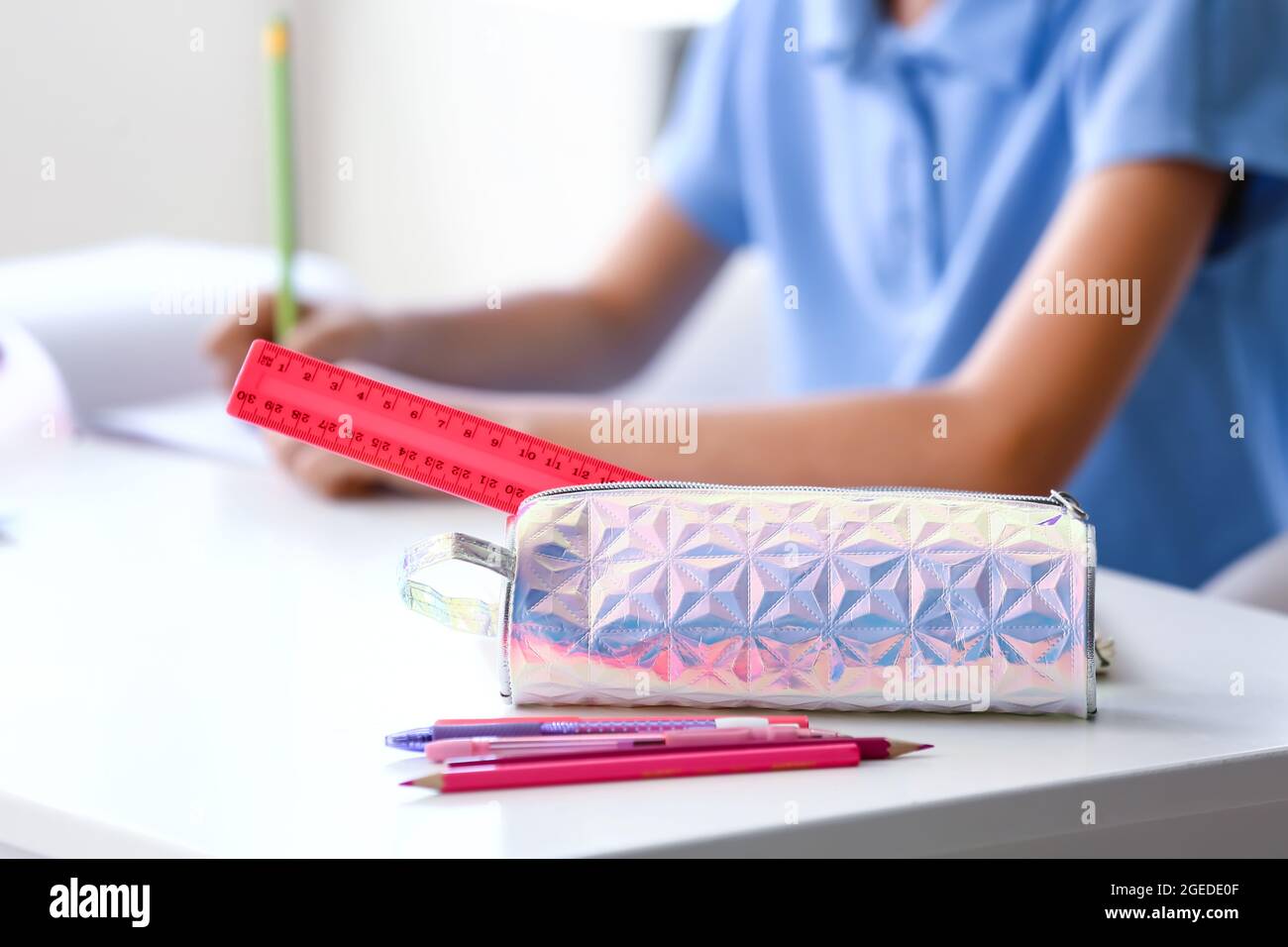 Child writing classroom ruler hi-res stock photography and images - Alamy