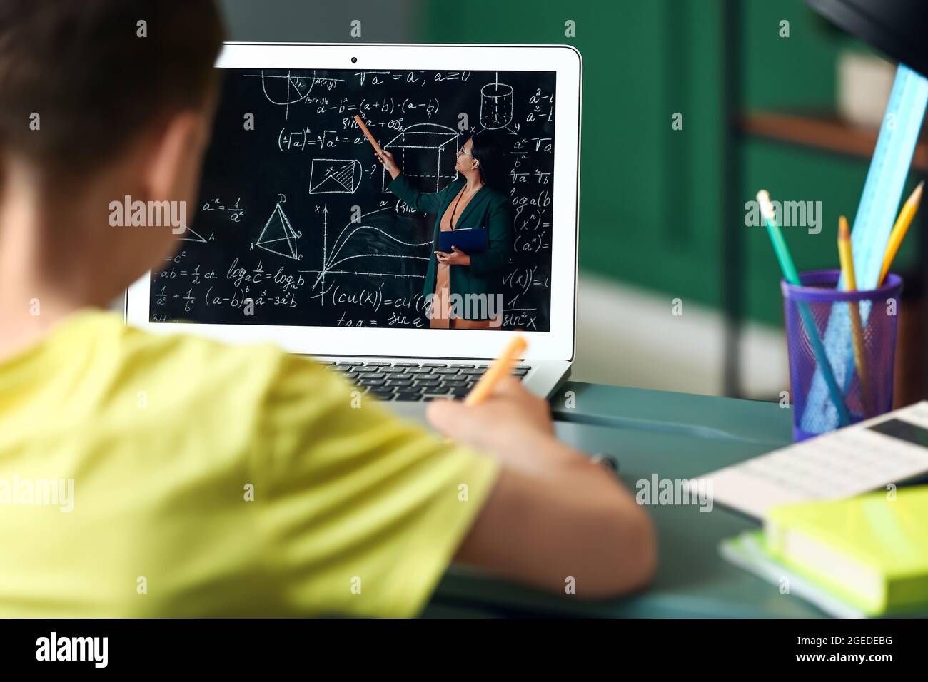 Little boy studying Math online at home Stock Photo - Alamy