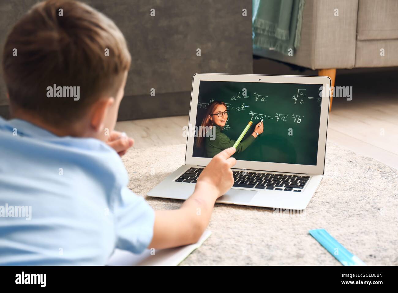 Little boy studying Math online at home Stock Photo - Alamy