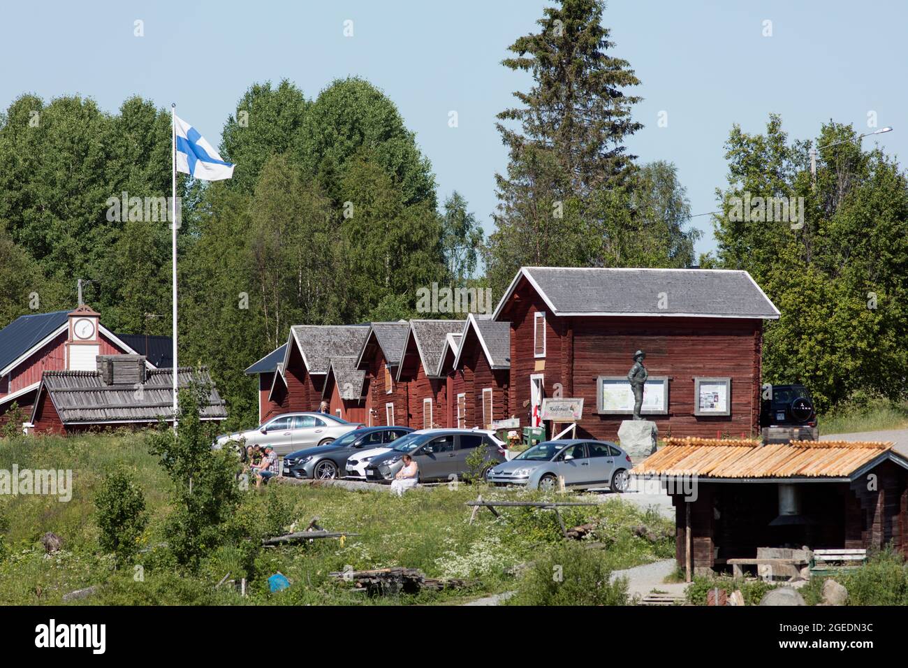 KUKKOLA, FINLAND ON JULY 02, 2021. View of the old wooden village. Buildings and activity. Unidentified people. Editorial use. Stock Photo