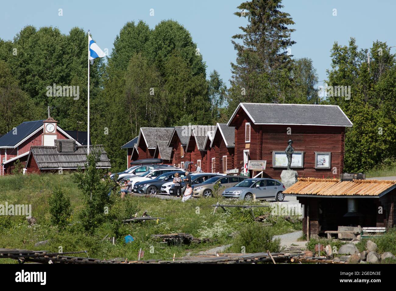 KUKKOLA, FINLAND ON JULY 02, 2021. View of the old wooden village. Buildings and activity. Unidentified people. Editorial use. Stock Photo