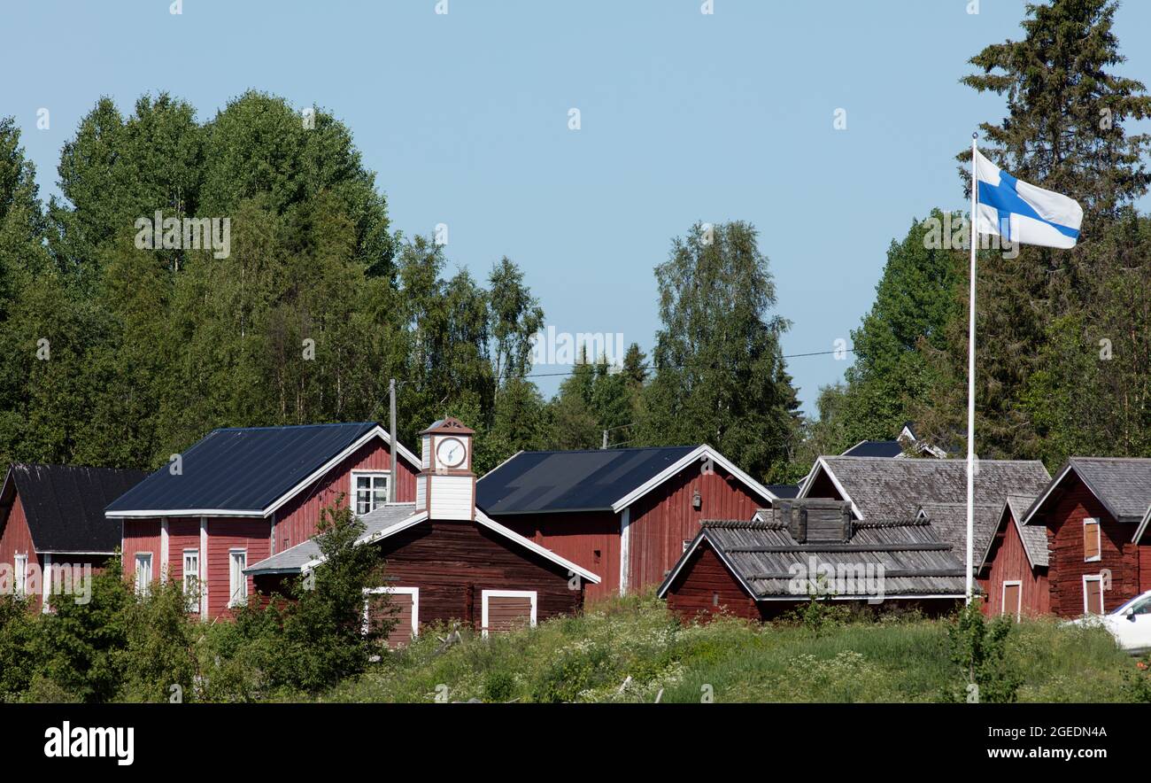 KUKKOLA, FINLAND ON JULY 02, 2021. View of the old wooden village. Buildings and standard. Editorial use. Stock Photo