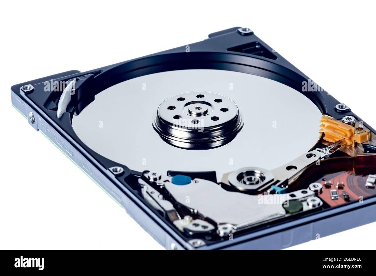 a computer's hard disk hdd data storage drive without shield show magnetic  disc and electronic part inside isolated in white background Stock Photo -  Alamy