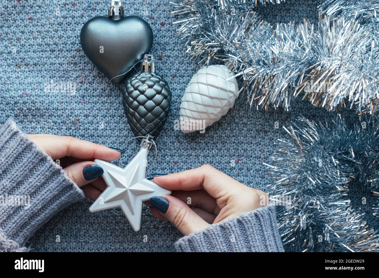 Female hands in knitted sweater with 