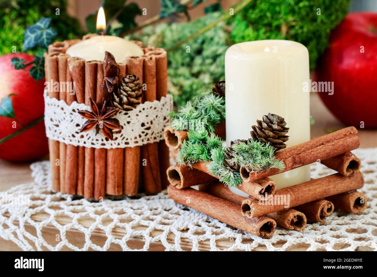 Candle decorated with cinnamon sticks. Christmas table decoration Stock  Photo - Alamy