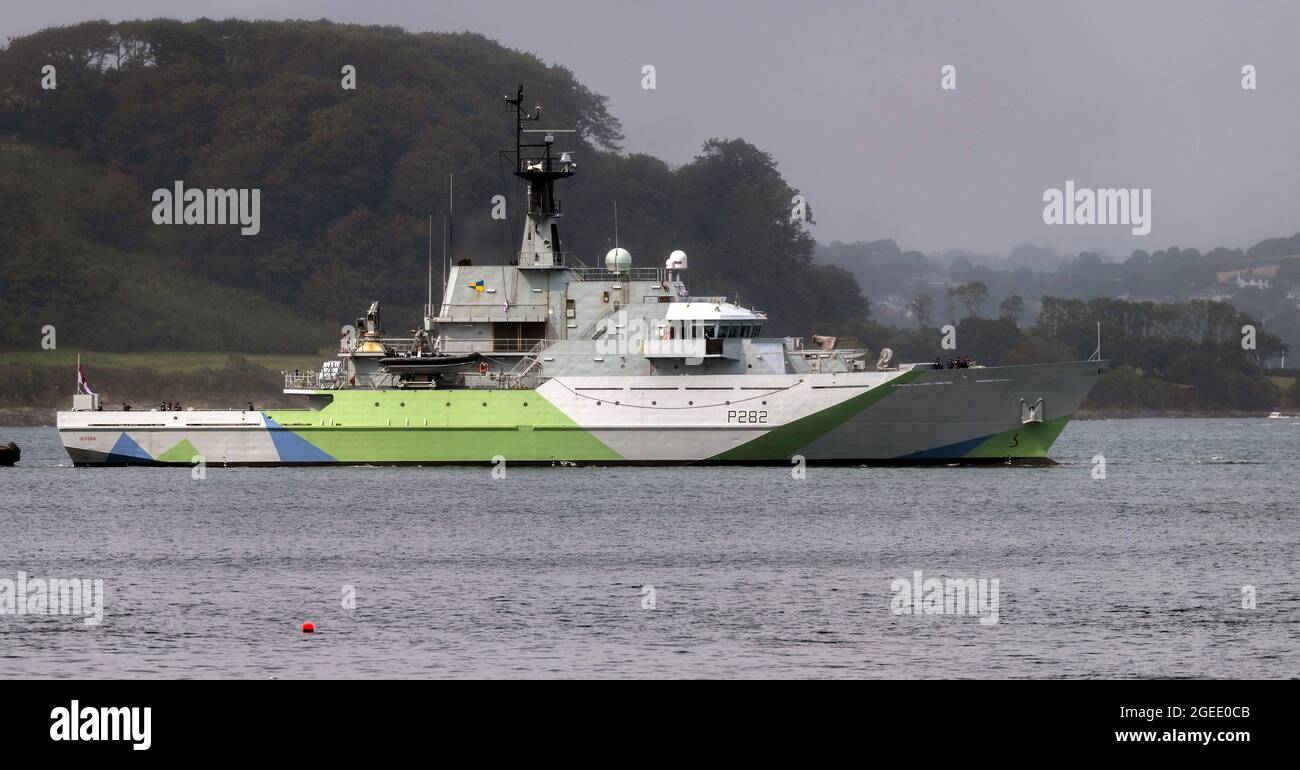 Falmouth Harbour, Cornwall, UK. 19th Aug 2021. Royal Navy Patrol ship HMS Severn P282 departs Falmouth Harbour in her new “Western Approaches” camouflage livery, first used on ships in World War Two. The livery is a tribute to all sailors who died and fought in the Battle of the Atlantic. HMS Severn will be re-commissioned on the 28th of August 2021 Credit: Bob Sharples/Alamy Live News Stock Photo