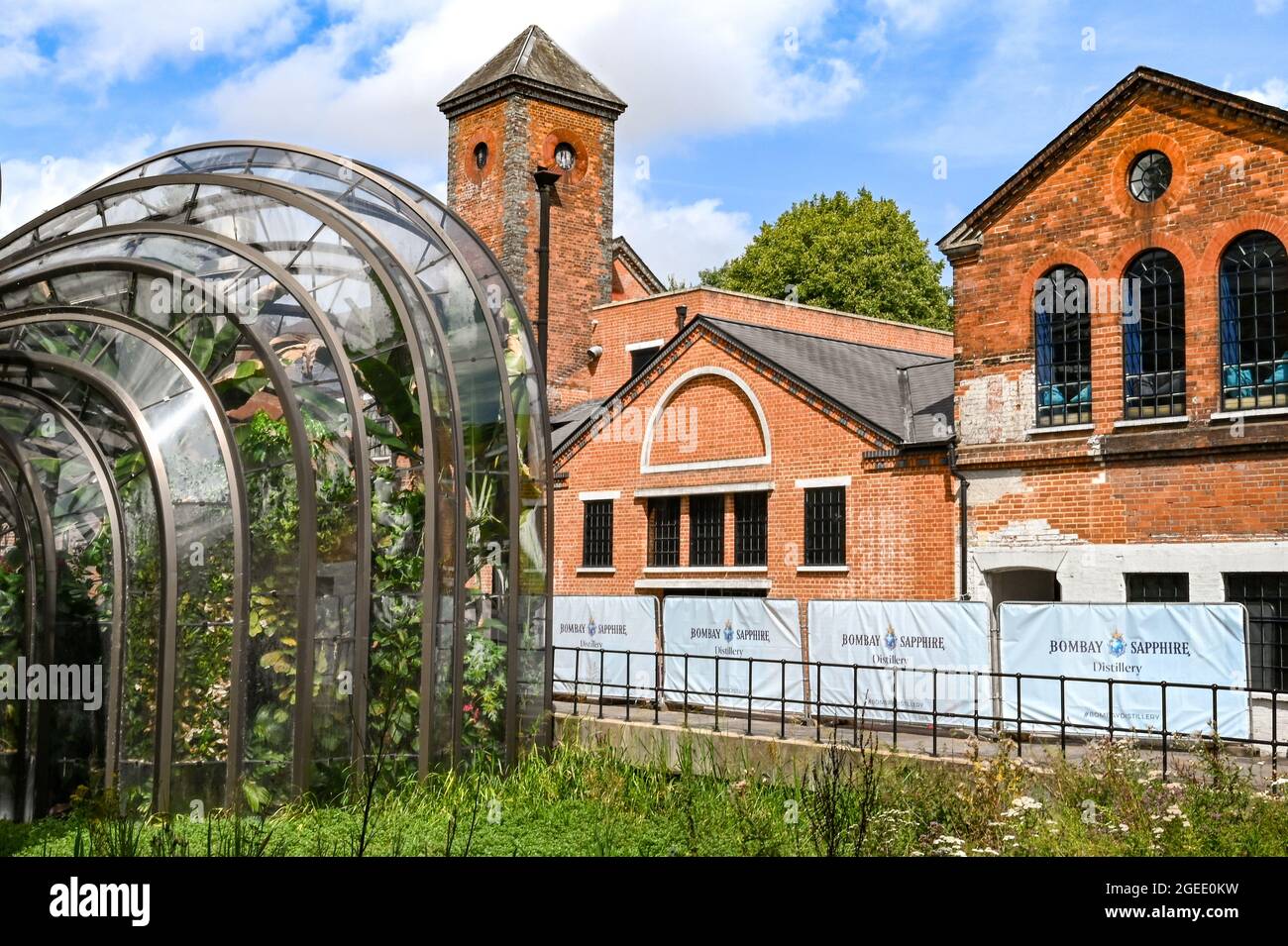 Whitchurch, Hampshire, England - August 2021: Large glasshouses, which from part of the Bombay Sapphire Gin Distillery Stock Photo