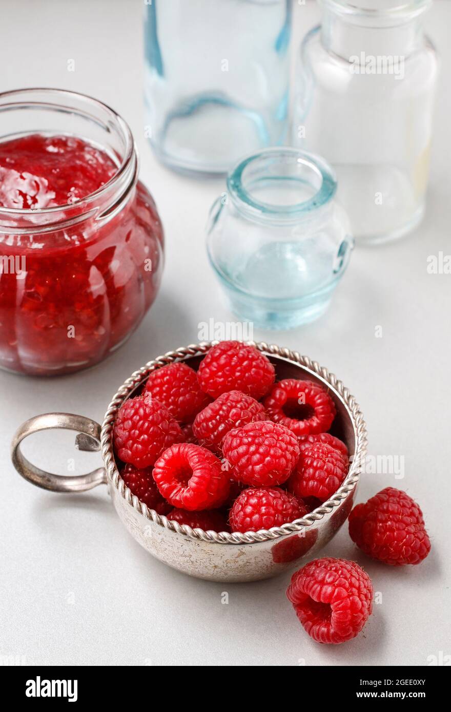 Bowl of raspberries and red jam. Healthy food Stock Photo - Alamy
