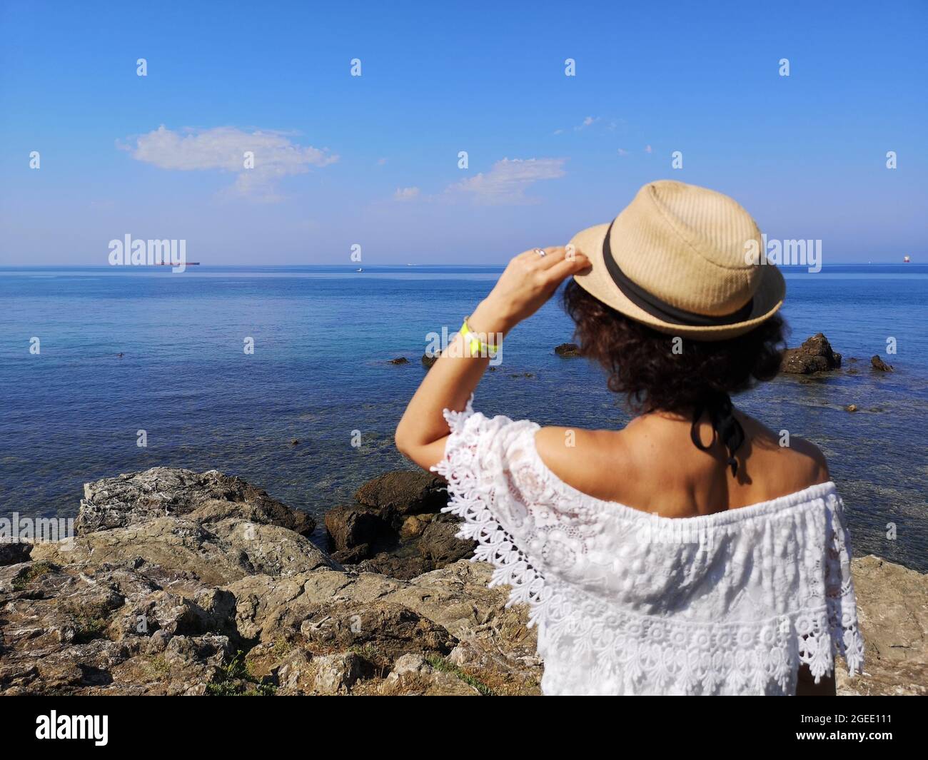 Woman on terrace admiring hi-res stock photography and images - Alamy