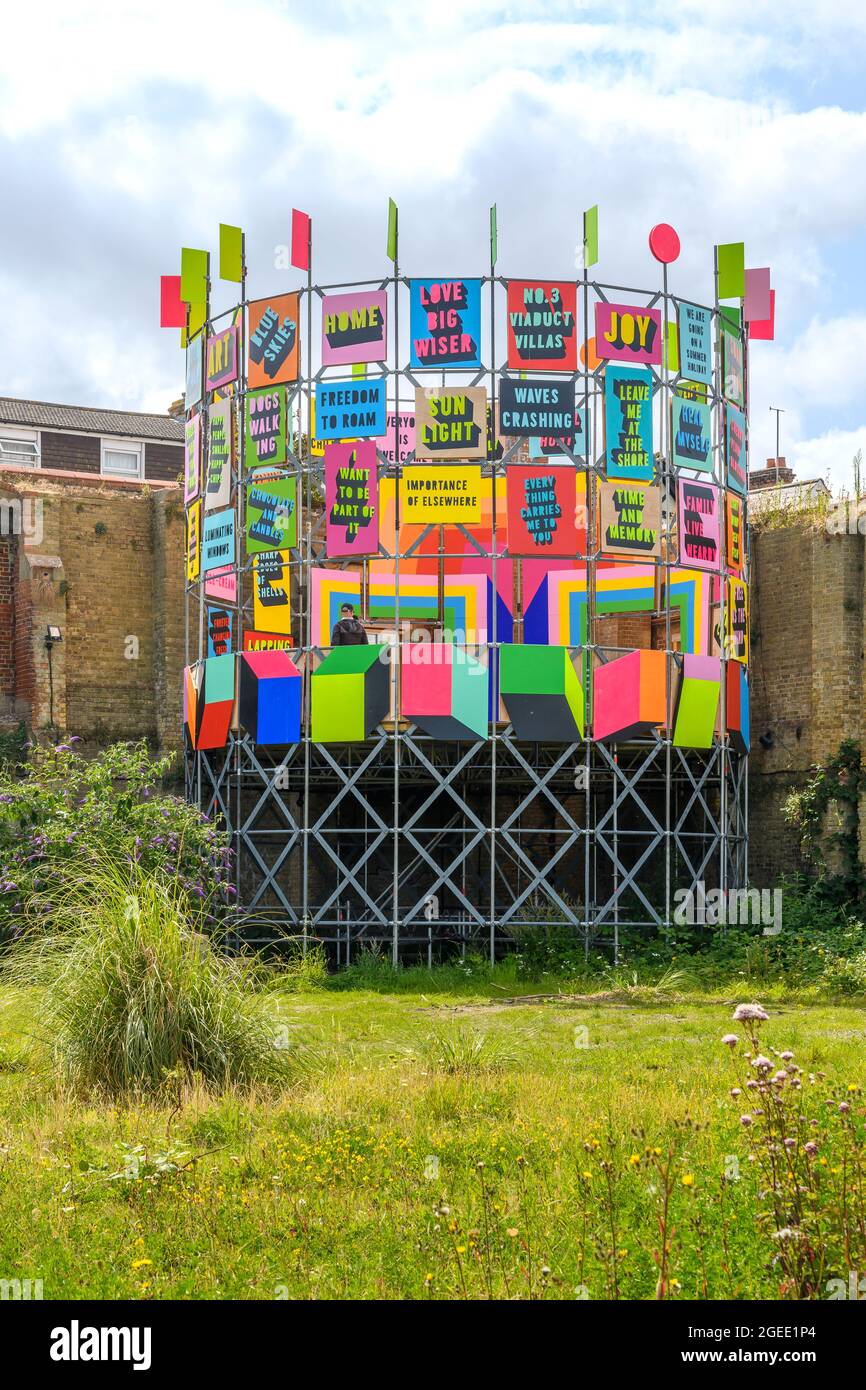 Flock of Seagulls Bag of Stolen Chips by Morag Myerscough at Folkestone Triennial 2021 arts festival. The work stands on the former gasworks site. Stock Photo
