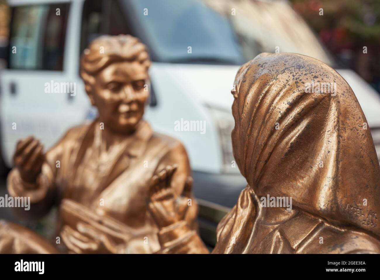 Detail of the statue of two women having a chat while stting on bench in Eskisehir, Turkey. Stock Photo