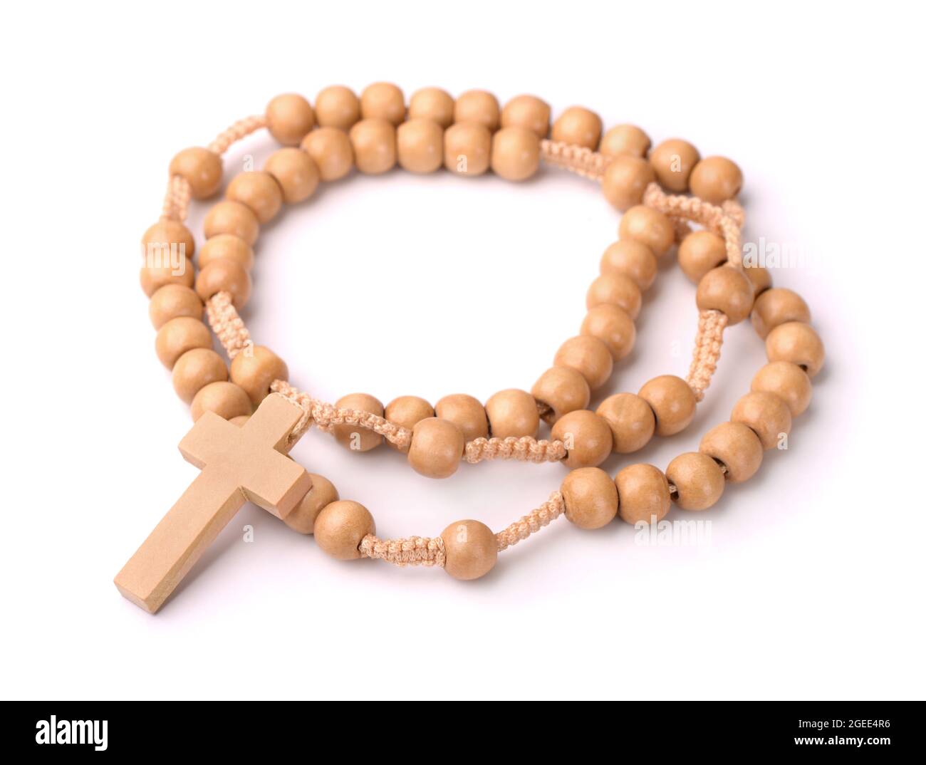 Wooden rosary beads and cross isolated on white Stock Photo