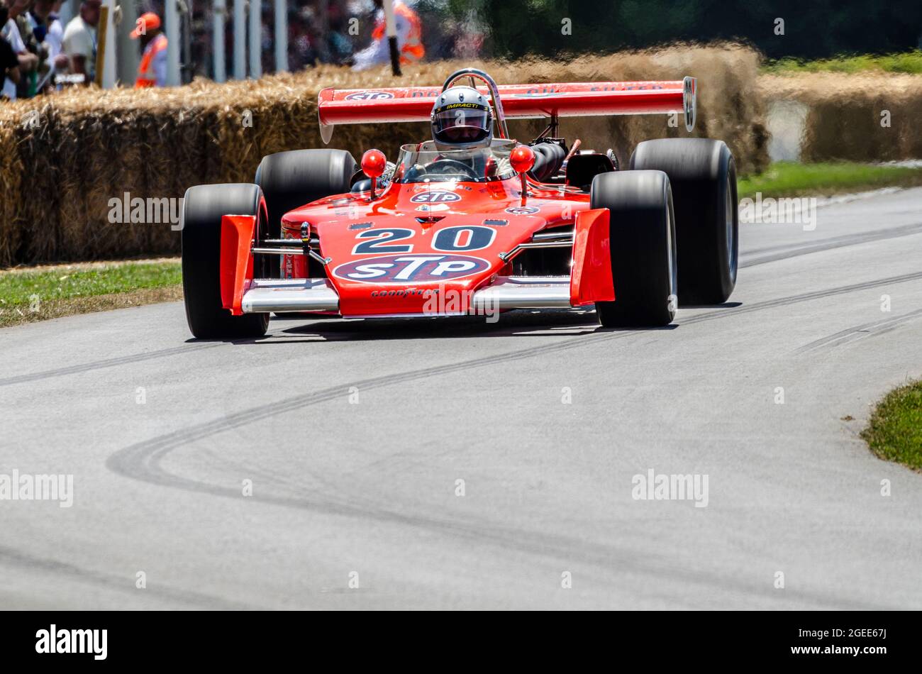 Eagle 7200 Offenhauser STP Indy 500 historic racing car driving up the hill climb track at the Goodwood Festival of Speed motor racing event Stock Photo
