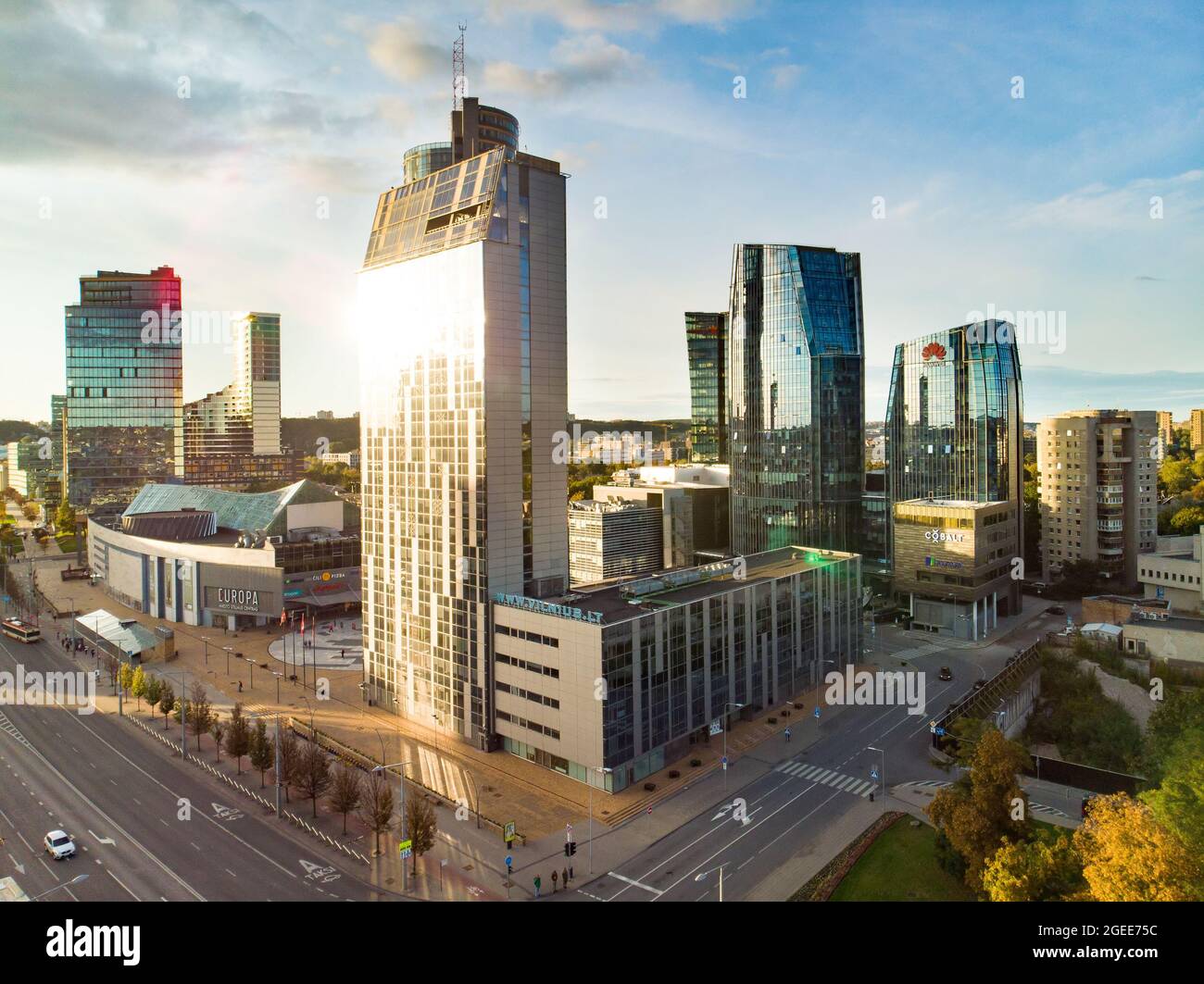 VILNIUS, LITHUANIA - OCTOBER 2019: Beautiful aerial evening view of Vilnius business district with scenic sunset illumination. City life in Vilnius, L Stock Photo