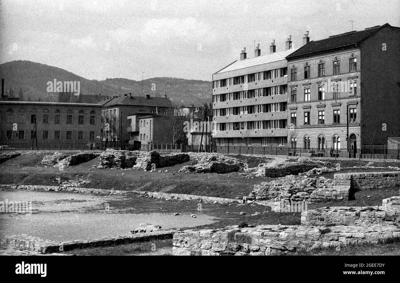 The Aquincum Military Amphitheater next to housing apartments in Obuda district Budapest Hungary in 1958 Stock Photo