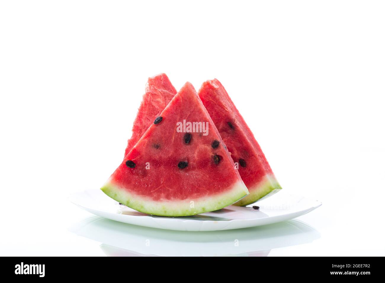 pieces of fresh ripe red watermelon on white background Stock Photo - Alamy