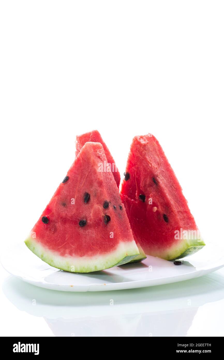 pieces of fresh ripe red watermelon on white background Stock Photo - Alamy