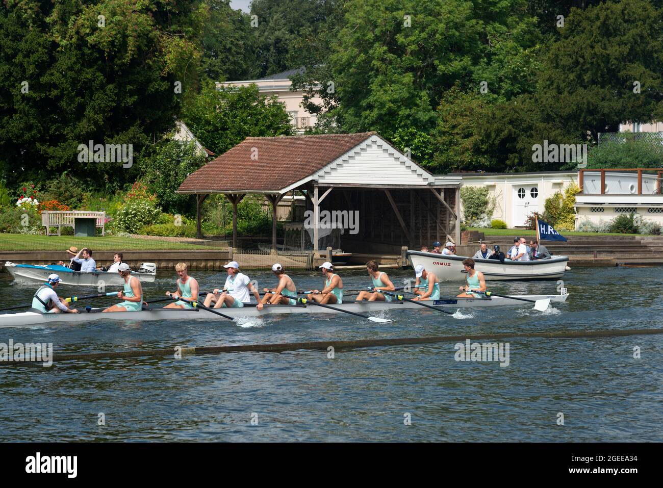 Eton College junior means eights rowing down to the start during the Henley Royal Regatta (2021), Henley-on-Thames, Oxfordshire, England, UK Stock Photo