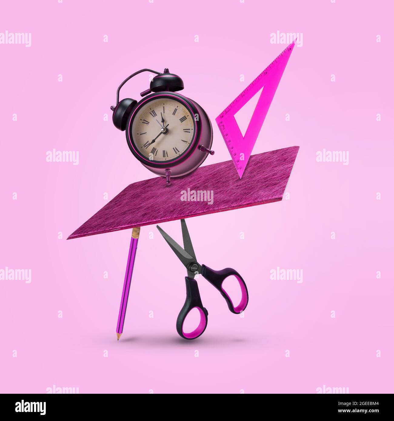 Creative idea made of notebook, pencil, ruler, scissors and alarm clock ...