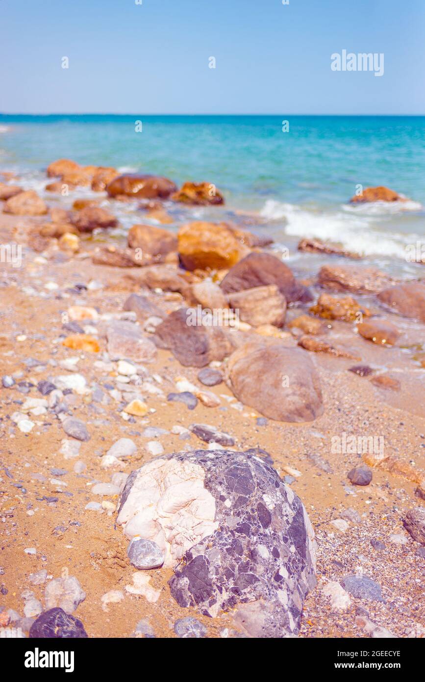 Beautiful colorful rocks on a beach Stock Photo - Alamy