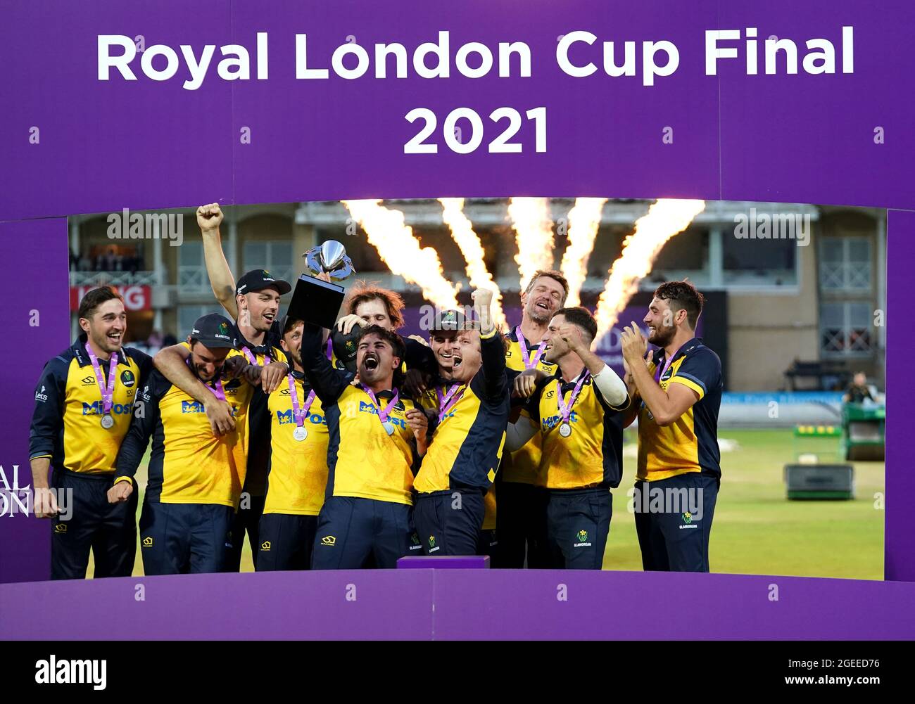Glamorgan captain Kiran Carlson (centre) and team-mates celebrate with the trophy following victory after the Royal London One-Day Cup Final at Trent Bridge, Nottingham. Picture date: Thursday August 19, 2021. See PA story CRICKET Final. Photo credit should read: Zac Goodwin/PA Wire. RESTRICTIONS: No commercial use without prior written consent of the ECB. Still image use only. No moving images to emulate broadcast. Editorial use only. No removing or obscuring of sponsor logos. Stock Photo