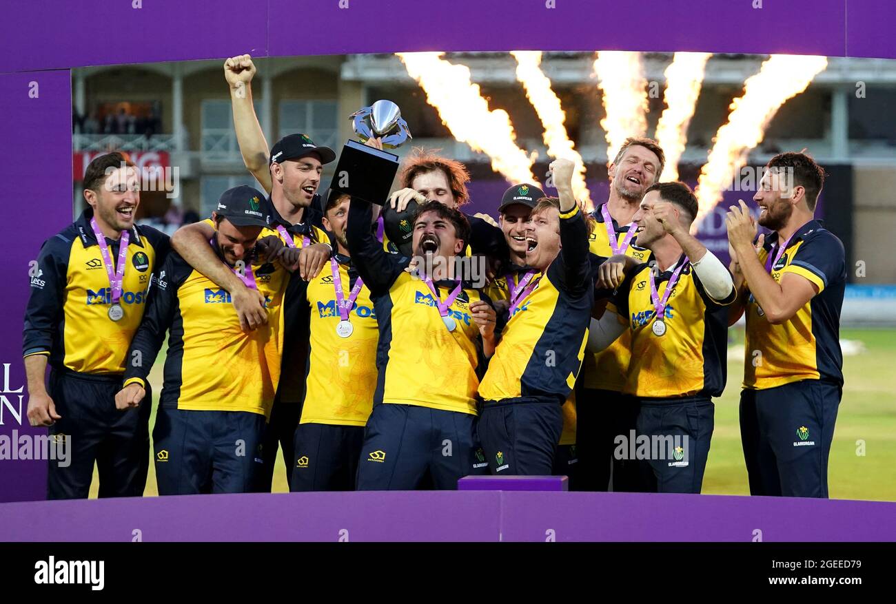 Glamorgan captain Kiran Carlson (centre) and team-mates celebrate with the trophy following victory after the Royal London One-Day Cup Final at Trent Bridge, Nottingham. Picture date: Thursday August 19, 2021. See PA story CRICKET Final. Photo credit should read: Zac Goodwin/PA Wire. RESTRICTIONS: No commercial use without prior written consent of the ECB. Still image use only. No moving images to emulate broadcast. Editorial use only. No removing or obscuring of sponsor logos. Stock Photo