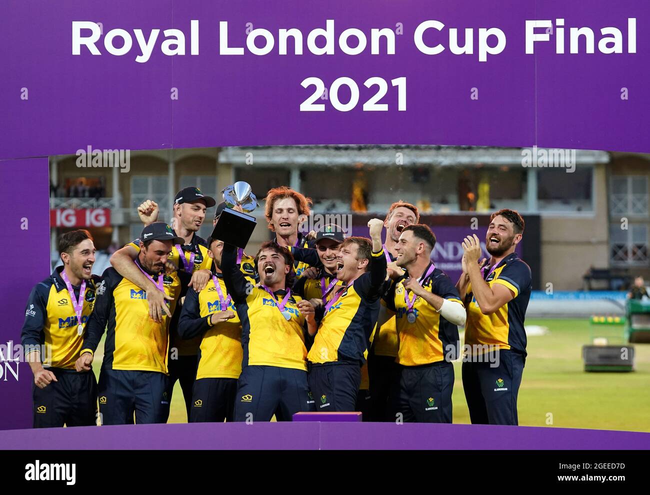 Glamorgan captain Kiran Carlson (centre) and team-mates celebrate with the trophy following victory after the Royal London One-Day Cup Final at Trent Bridge, Nottingham. Picture date: Thursday August 19, 2021. See PA story CRICKET Final. Photo credit should read: Zac Goodwin/PA Wire. RESTRICTIONS: No commercial use without prior written consent of the ECB. Still image use only. No moving images to emulate broadcast. Editorial use only. No removing or obscuring of sponsor logos. Stock Photo