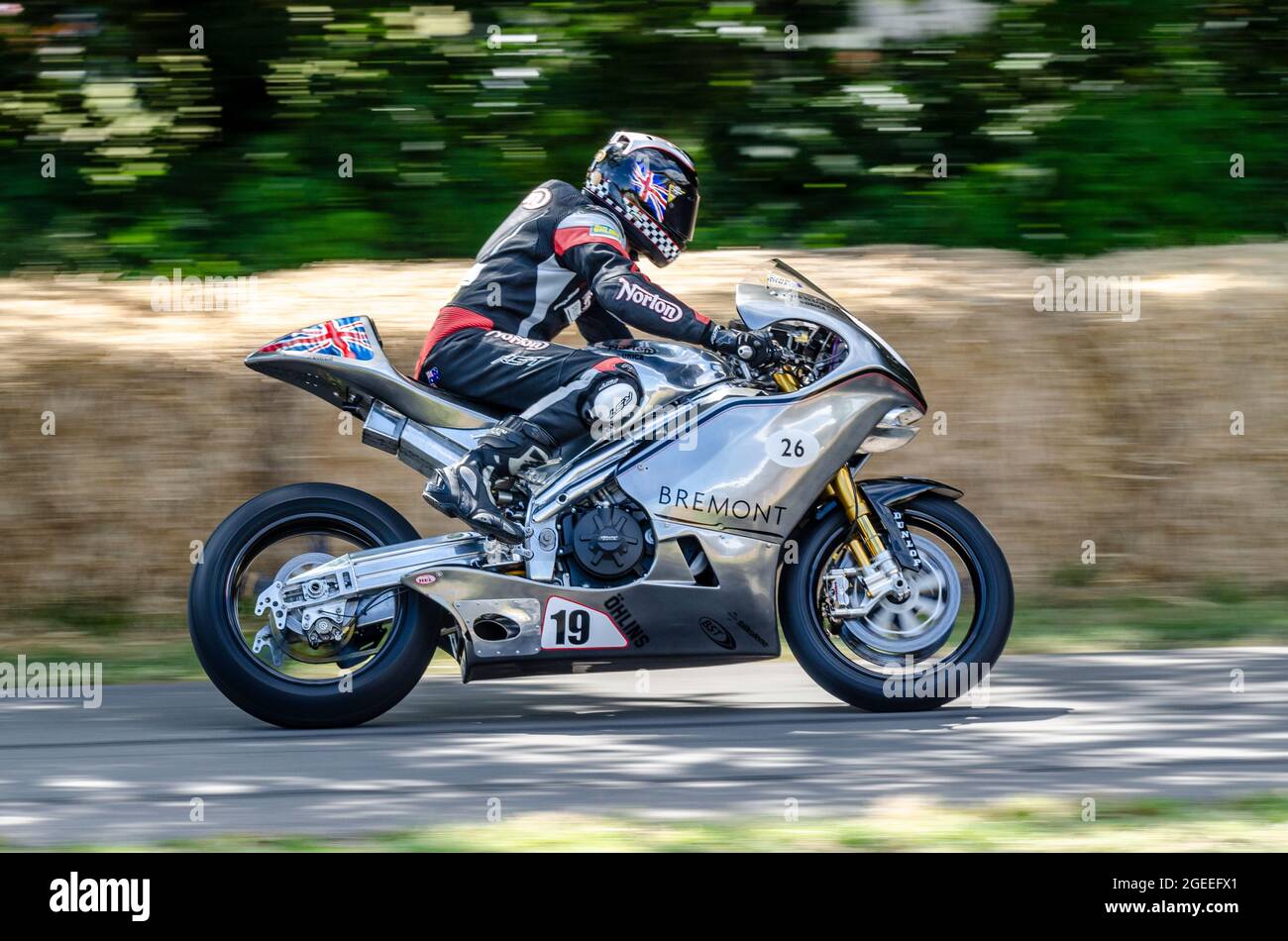 Bremont Norton SG3 TT motorcycle racing up the hill climb track at the Goodwood Festival of Speed motor racing event 2014 Stock Photo