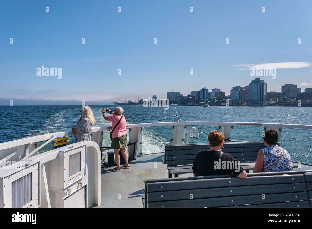 Halifax, Canada - 10 August 2021: Passengers on a Halifax Transit Ferry going to Dartmouth Stock Photo