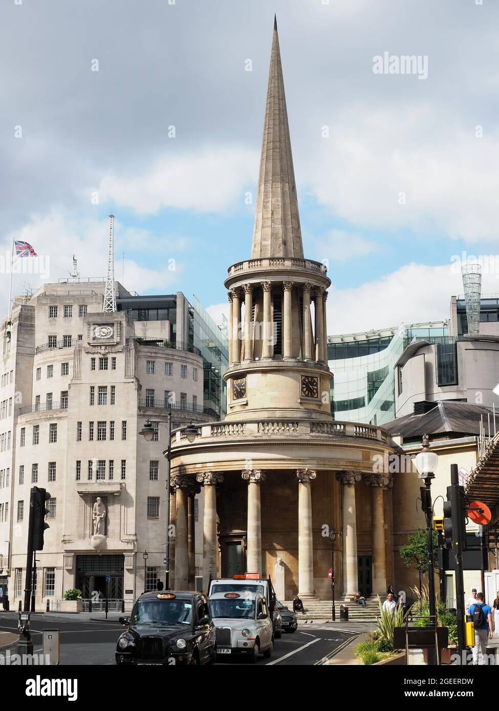 View of All Souls Church in Langham Place London next to BBC Broadcasting House on a sunny summer day Stock Photo