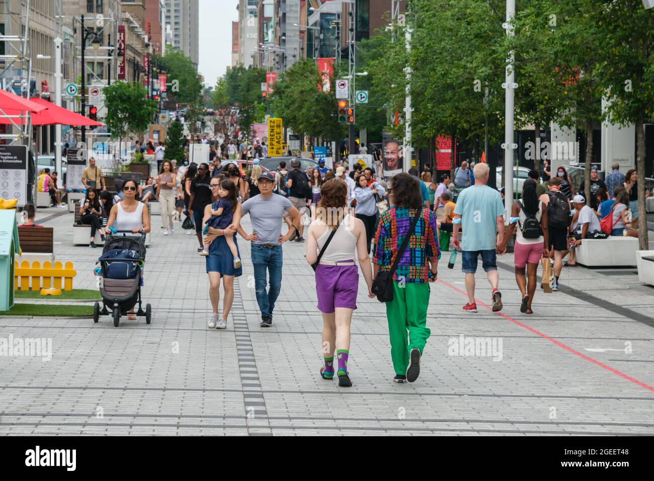 Montreal, CA - 17 July 2021: People walking on Sainte Catherine Street ...