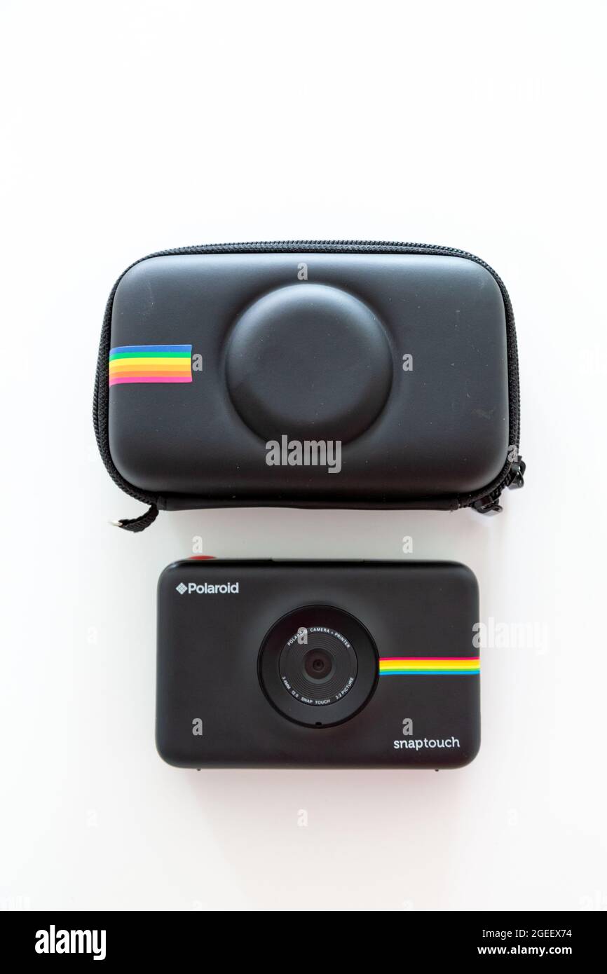 MILAN, ITALY - Aug 03, 2021: A vertical closeup of the new Polaroid snap  touch 2 on a white table Stock Photo - Alamy