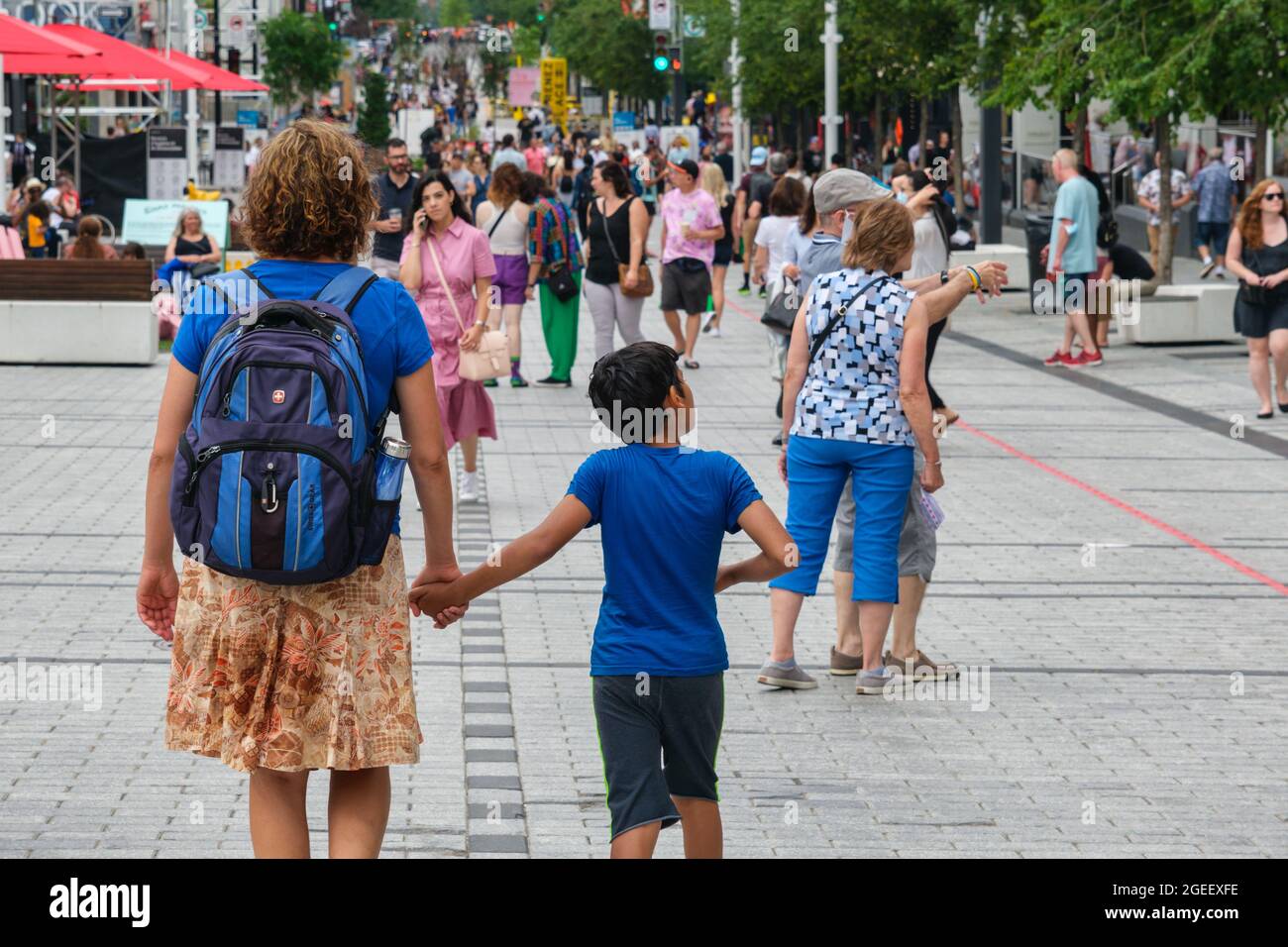 Montreal, CA - 17 July 2021: People walking on Sainte Catherine Street ...