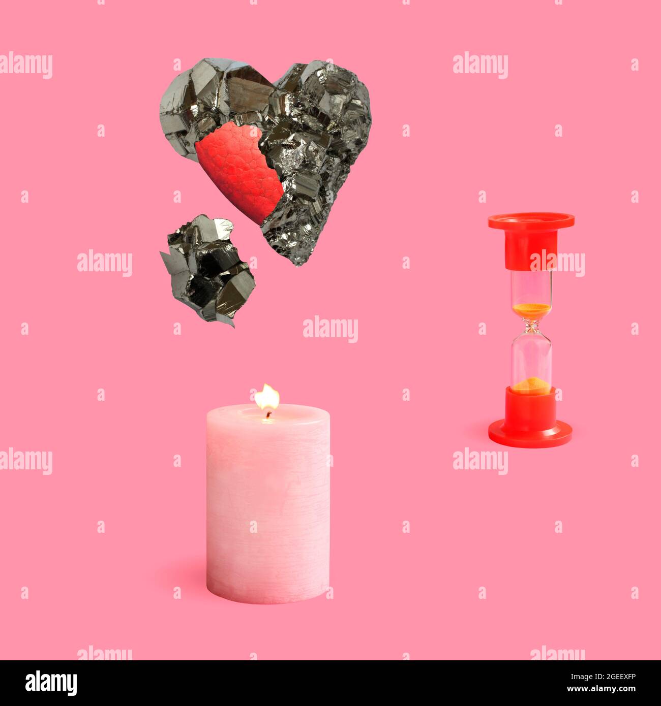 Two burning heart shaped candles and candies on a grungy background, Stock  image