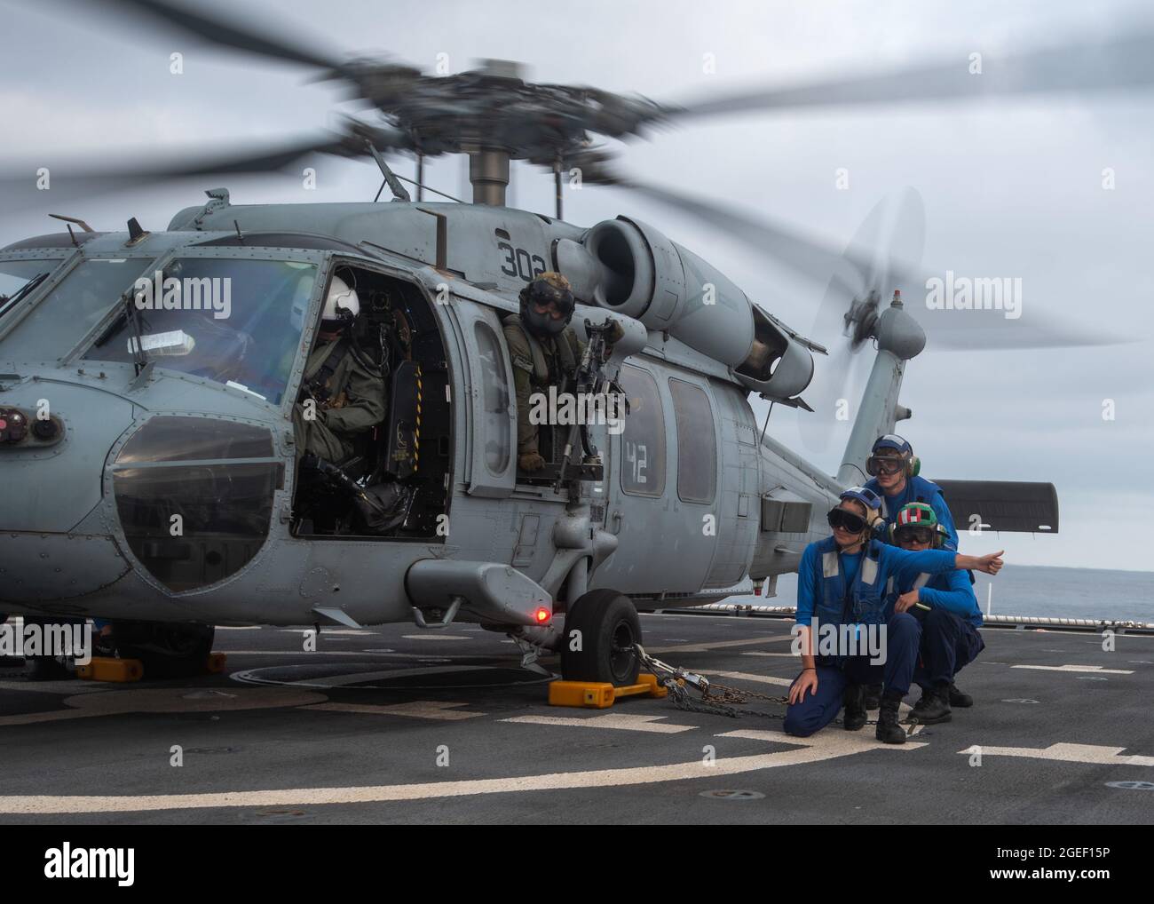 Coast Guard Members Onboard The Coast Guard Cutter Munro Conduct 