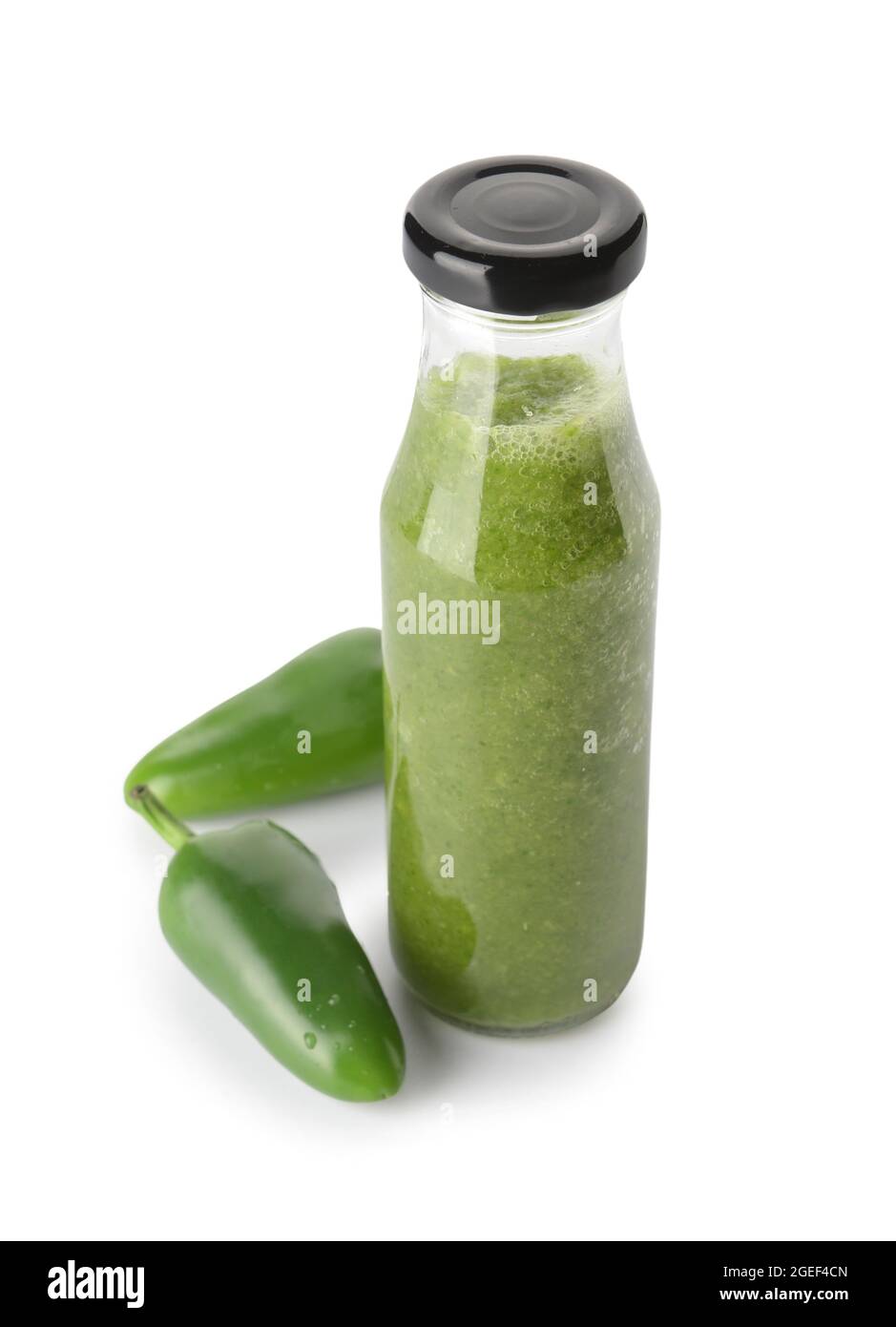 Bottle of Tomatillo Salsa Verde sauce on white background Stock Photo