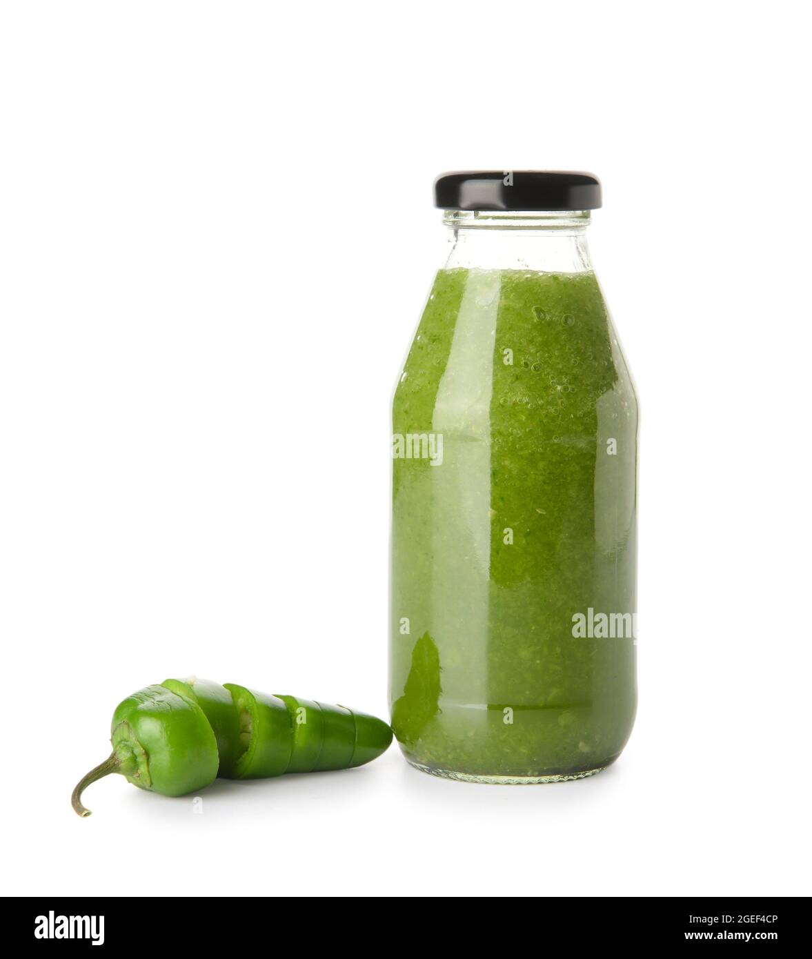 Bottle of Tomatillo Salsa Verde sauce on white background Stock Photo