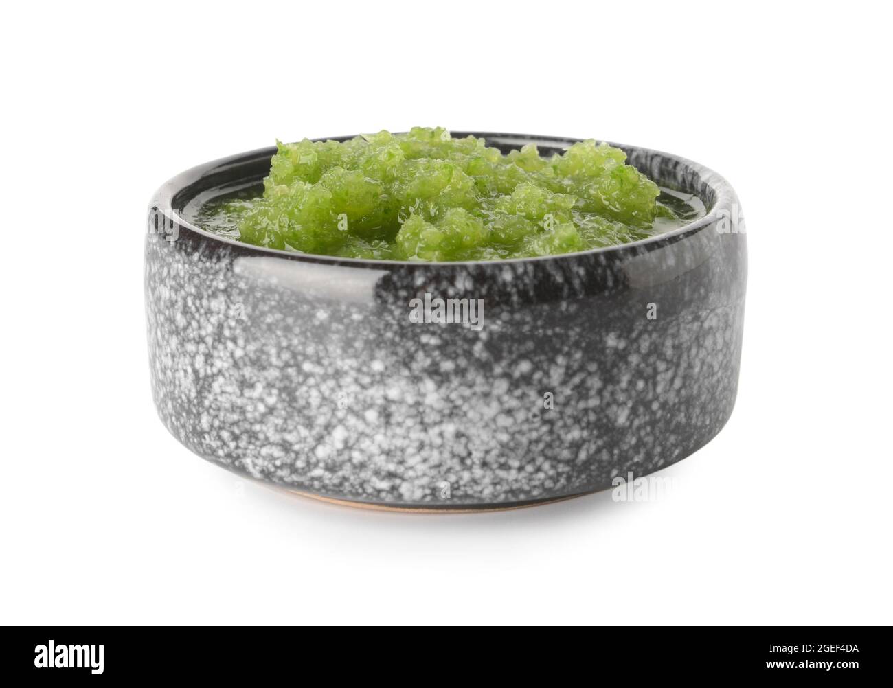Bowl of Tomatillo Salsa Verde sauce on white background Stock Photo