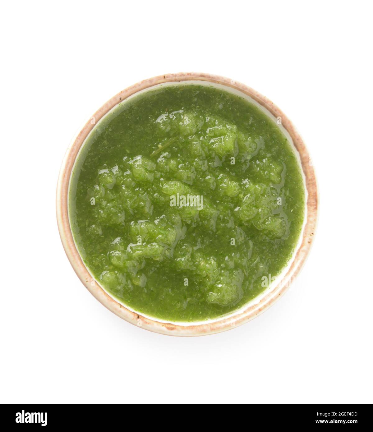 Bowl of Tomatillo Salsa Verde sauce on white background Stock Photo