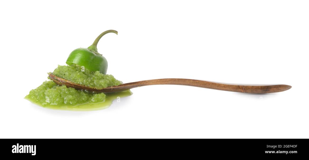 Spoon with Tomatillo Salsa Verde sauce on white background Stock Photo