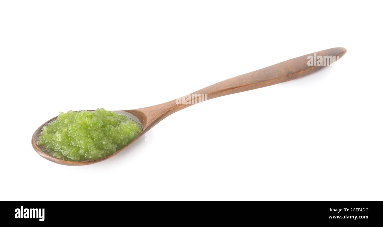 Spoon with Tomatillo Salsa Verde sauce on white background Stock Photo
