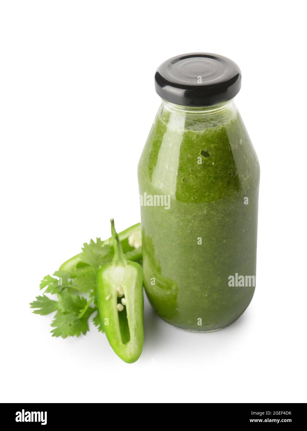 Bottle of Tomatillo Salsa Verde sauce on white background Stock Photo