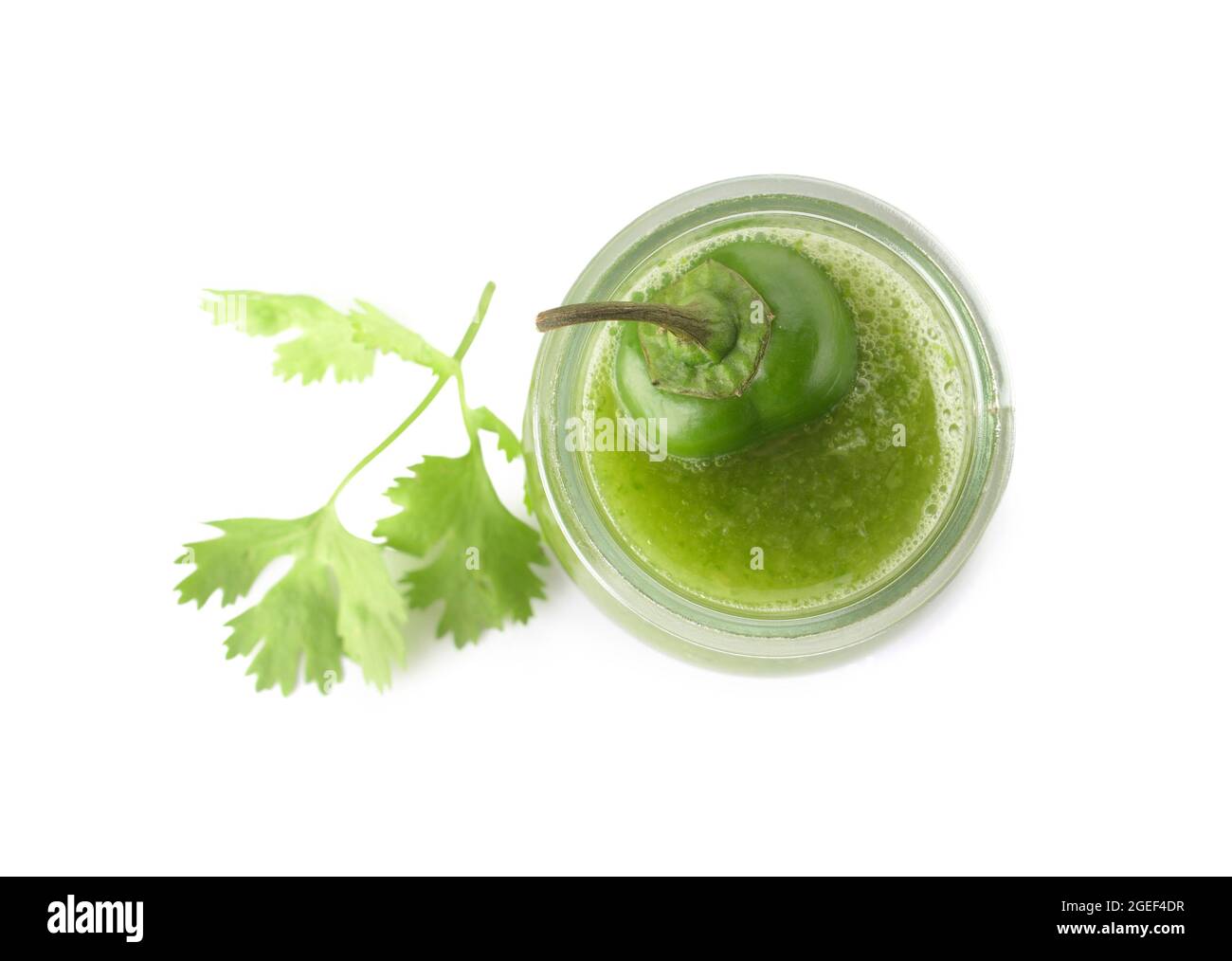 Glass jar of Tomatillo Salsa Verde sauce on white background Stock Photo