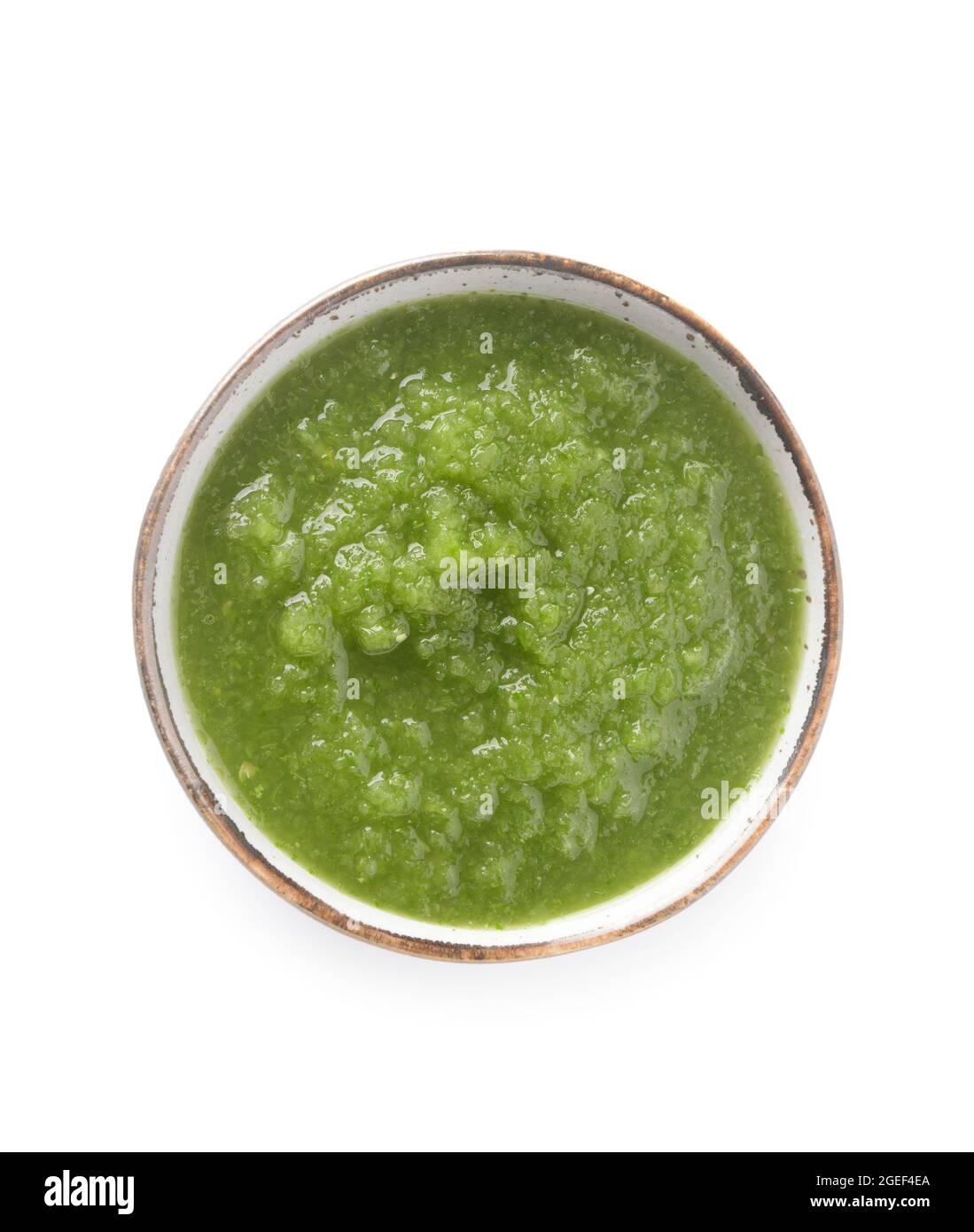 Bowl of Tomatillo Salsa Verde sauce on white background Stock Photo