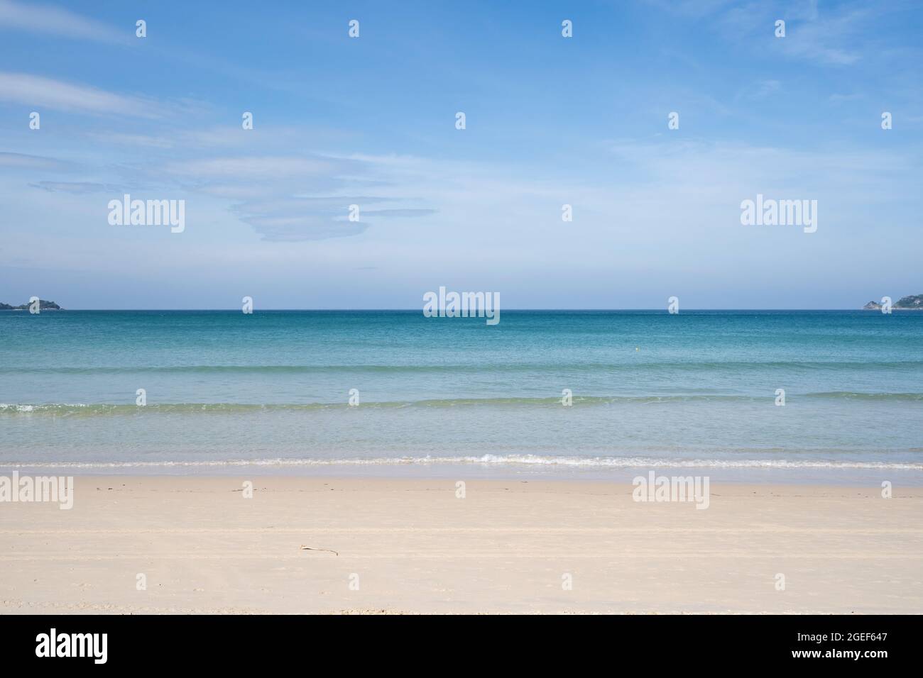 Tropical sandy beach with blue ocean and blue sky background image for ...