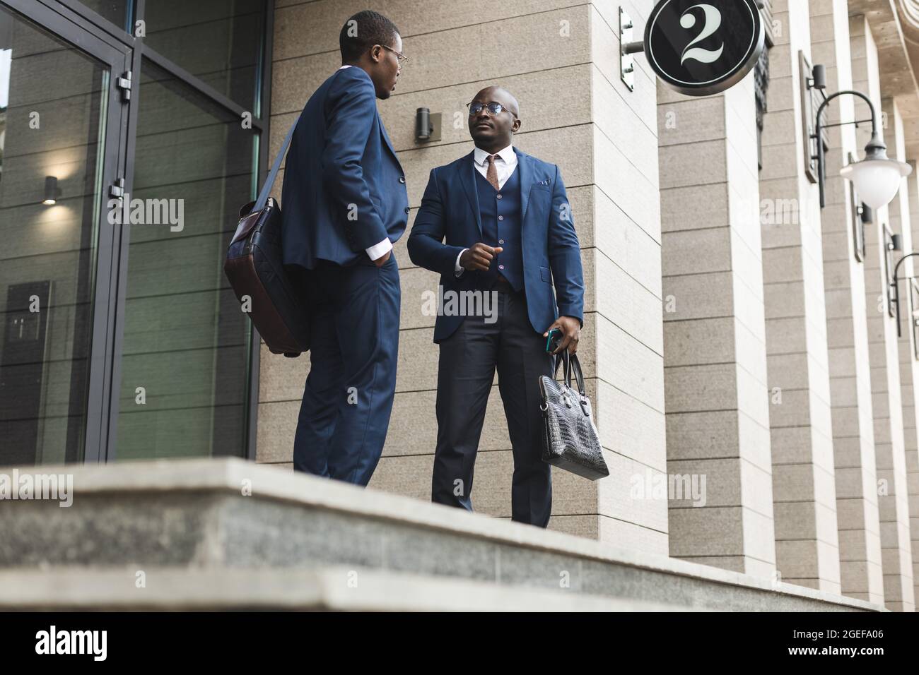 Black people in suits hi-res stock photography and images - Alamy