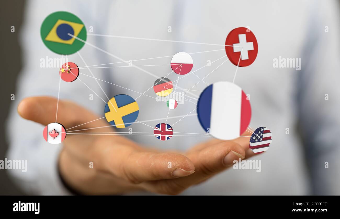 Hand holding an interconnected network of international flags Stock
