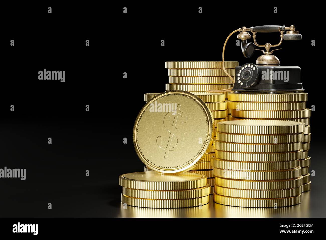 Vintage telephone set on top of stacked gold coins in a dark black background. The concept of business communication or the concept of business in tel Stock Photo