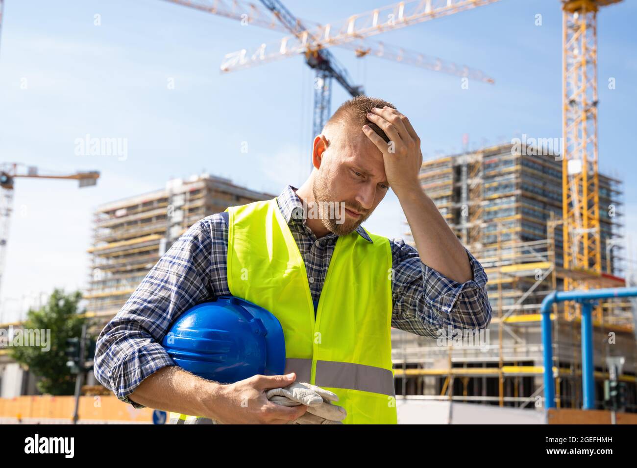 Unhappy Sad Construction Worker. Upset Foreman Frustration Stock Photo