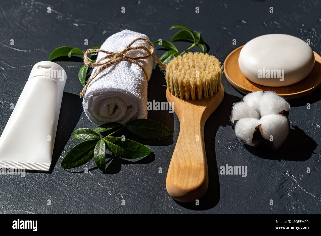 bathroom accessories on black background. Home spa treatment. Personal tools for skin care. Stock Photo